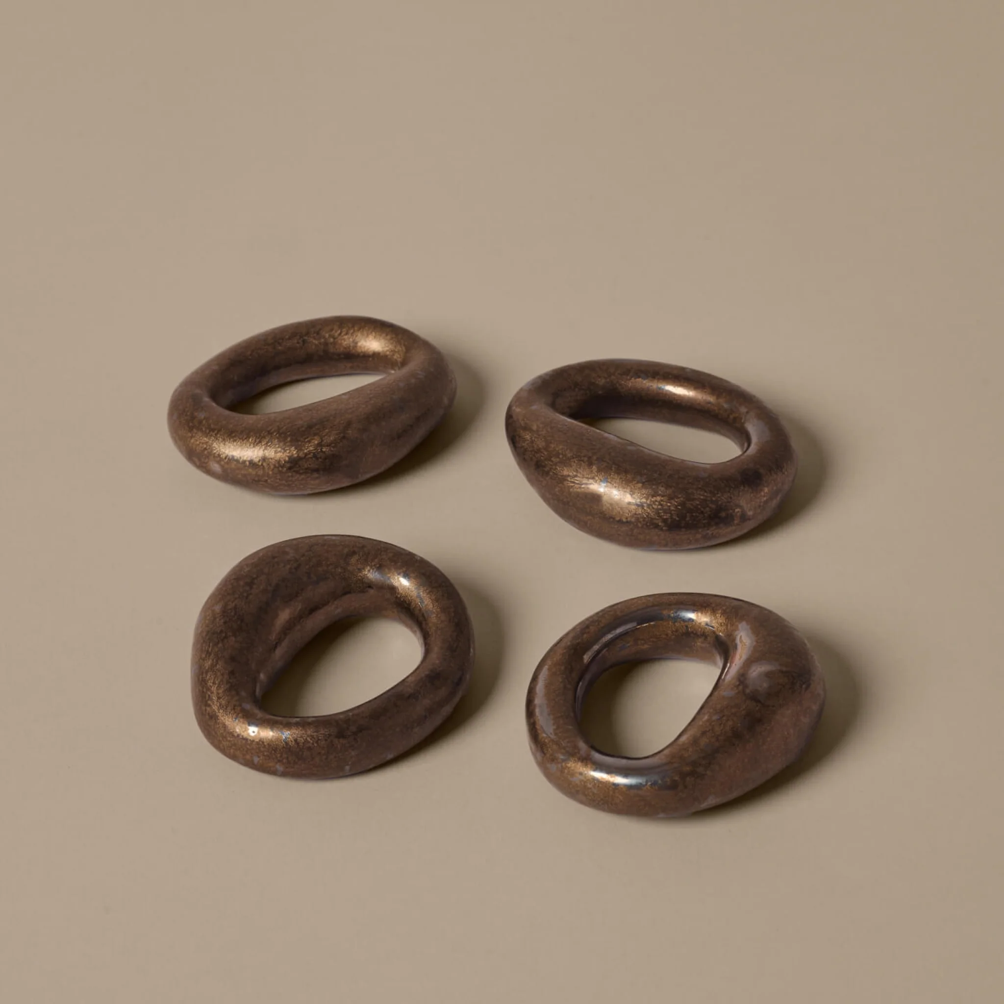 FERM LIVING Orrith Napkin Rings, Rustic Bronze, (Set of 4) - Image 3